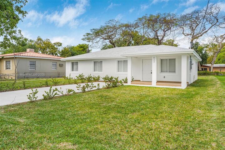 Property Photo:  933 NW 50th St  FL 33127