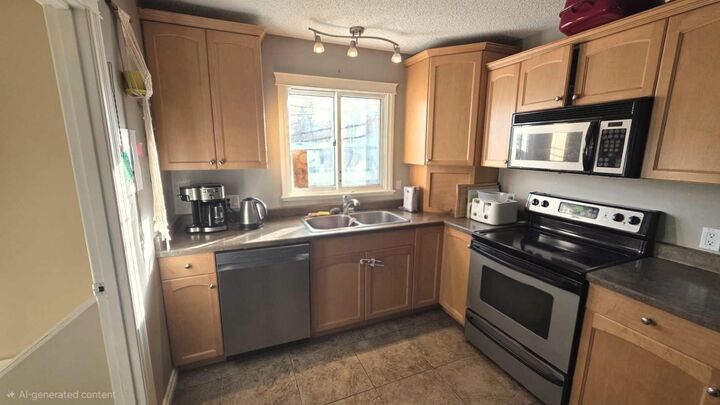 Property Photo:  10905 91 Street  AB T8S 1P9