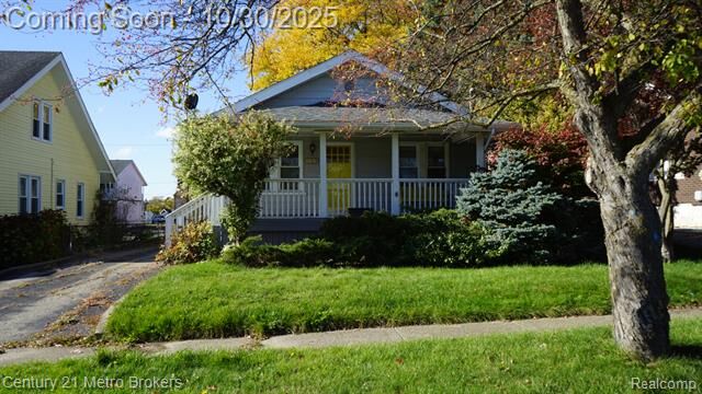 Property Photo:  709 Cadillac Street  MI 48504 