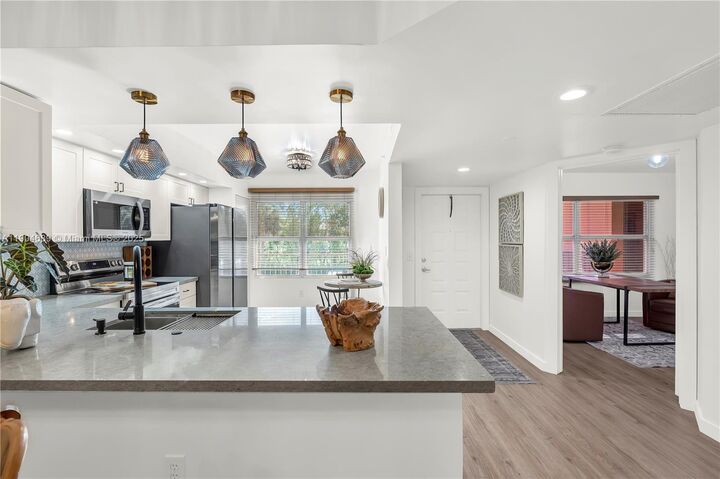 Property Photo:  701 SW 142nd Ave 208S  FL 33027