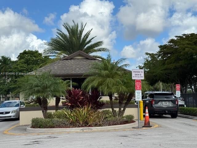 Property Photo:  200 SW 132nd Way 212L  FL 33027