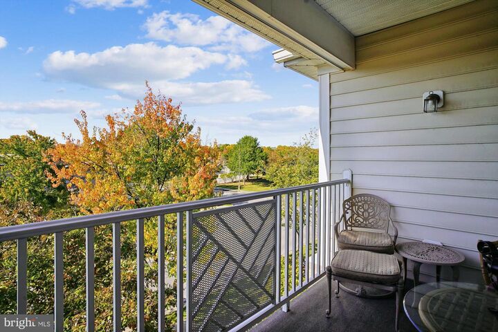 Property Photo:  411 Hamlet Club Drive 304  MD 21037