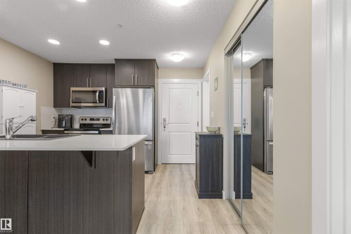 Property Photo: 1506 Tamarack Boulevard NW 101 AB T6T 2J5