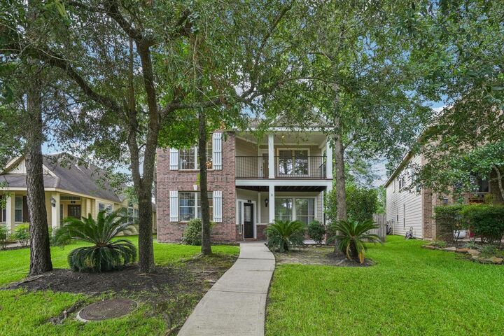 Property Photo: 90 Panterra Way TX 77382