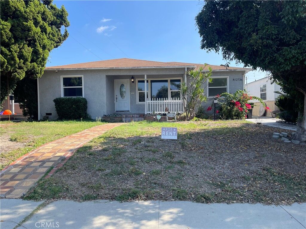 Property Photo:  12736 Downey B  CA 90242 