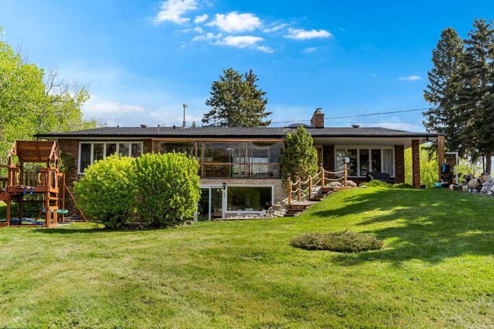 Property Photo: 24157 Meadow Drive AB T3R 1A8