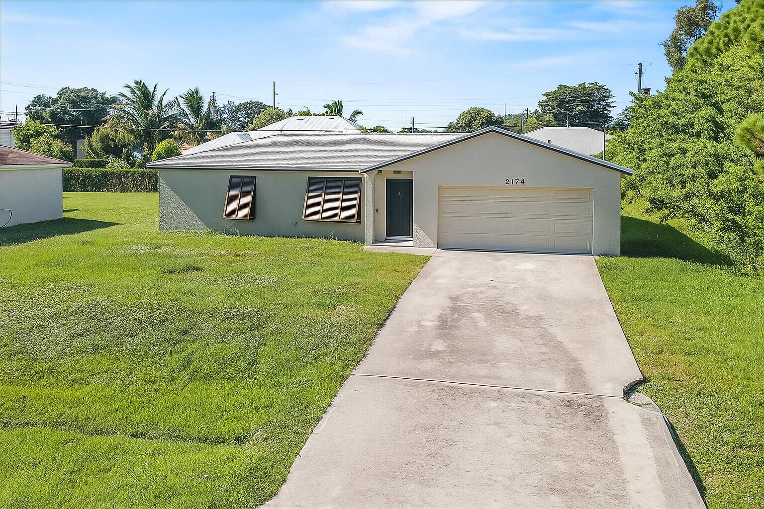 Property Photo: 2174 SW Larchmont Lane FL 34984