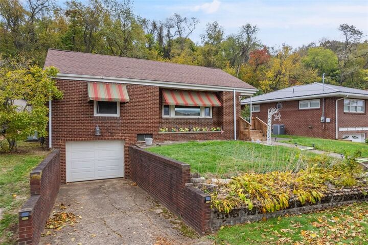 Property Photo:  1233 Virginia Ave  PA 15059 
