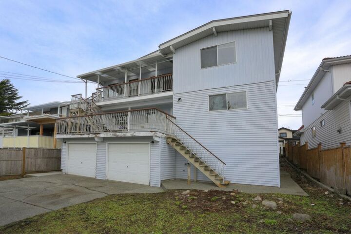 Photo de la propriété:  448 E 59th Avenue  BC V5X 1Y1 