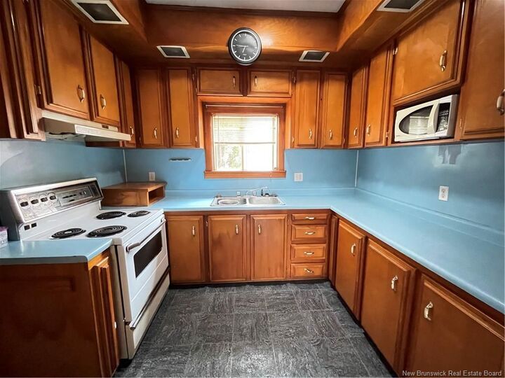 Property Photo:  28 First Avenue  NB E6J 1S4 