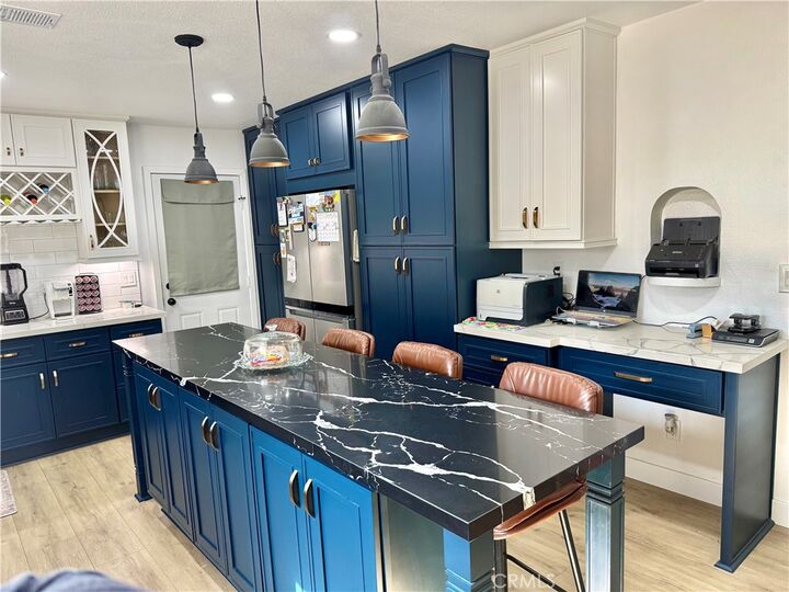 Property Photo:  7040 Barton  CA 92404 