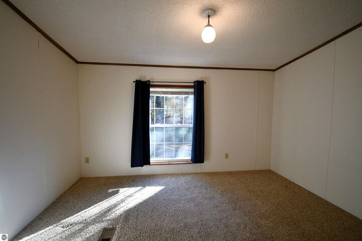 Property Photo:  8990 Park Avenue  MI 49706 