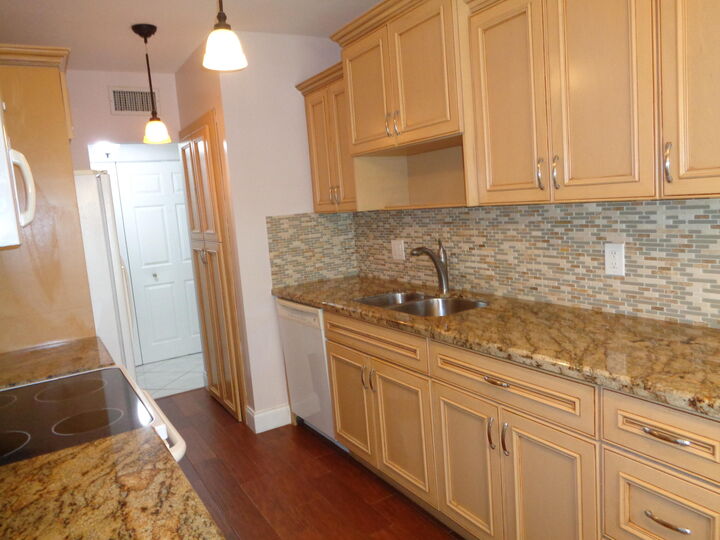 Property Photo:  6328 Longboat Lane W 201  FL 33433 