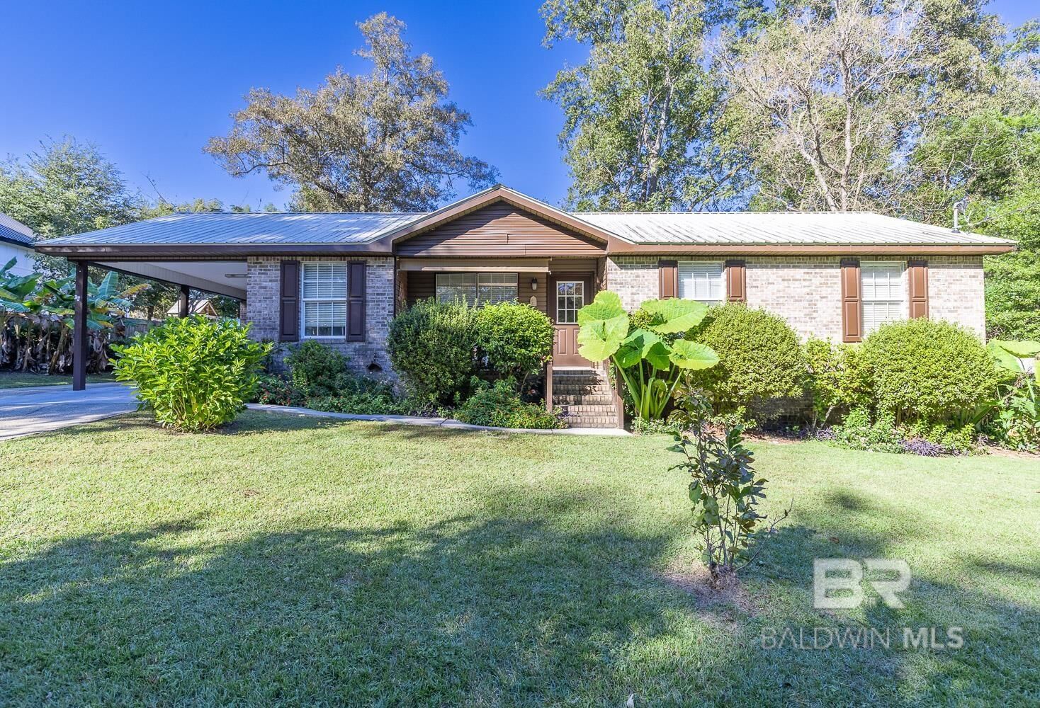 Property Photo:  22212 Hill N Dale Drive  AL 36576 