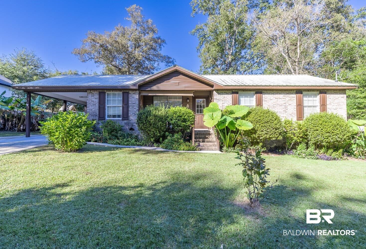 Property Photo: 22212 Hill N Dale Drive AL 36576