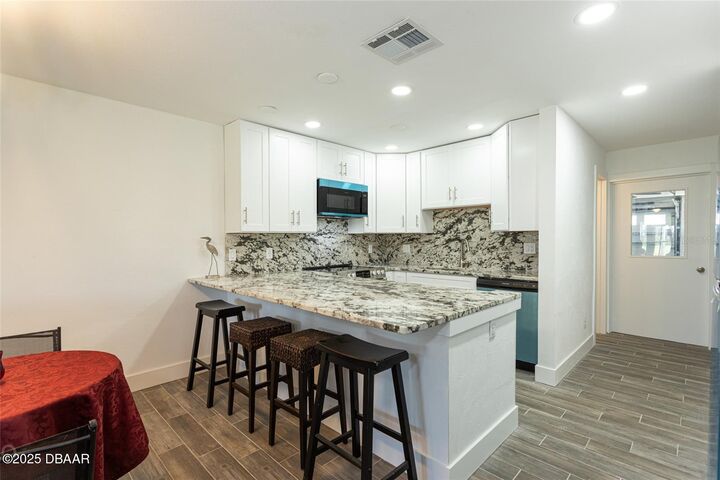 Property Photo:  23 Ocean Palm Villa Street N 23  FL 32136 