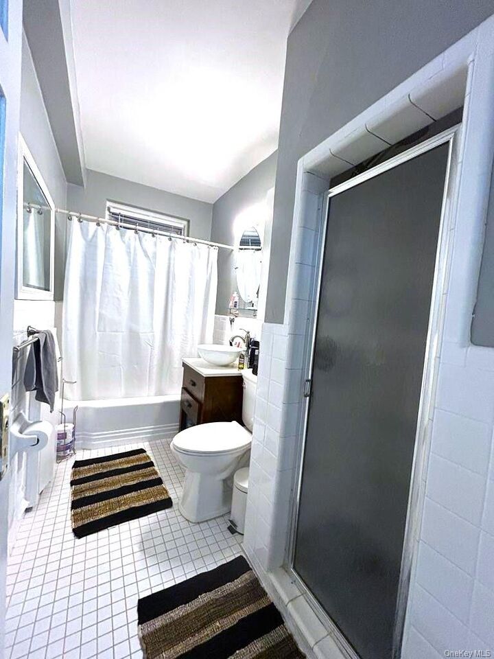 Property Photo: 230 Central Ave 1F NY 11559