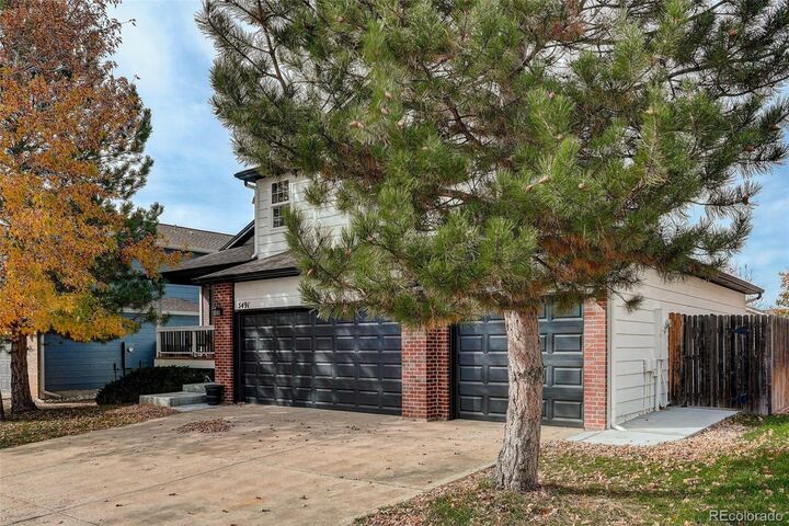 Property Photo: 5491 S Versailles Street CO 80015