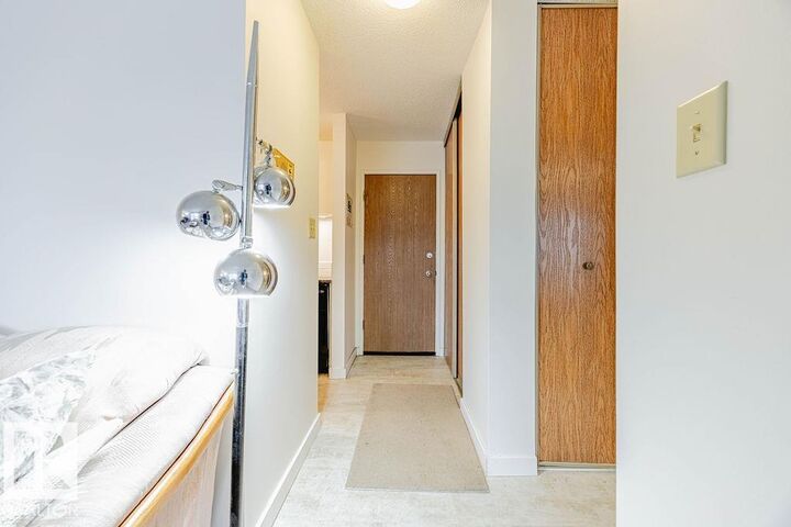 Property Photo:  2545 116 Street NW 106  AB T6J 3Z7 