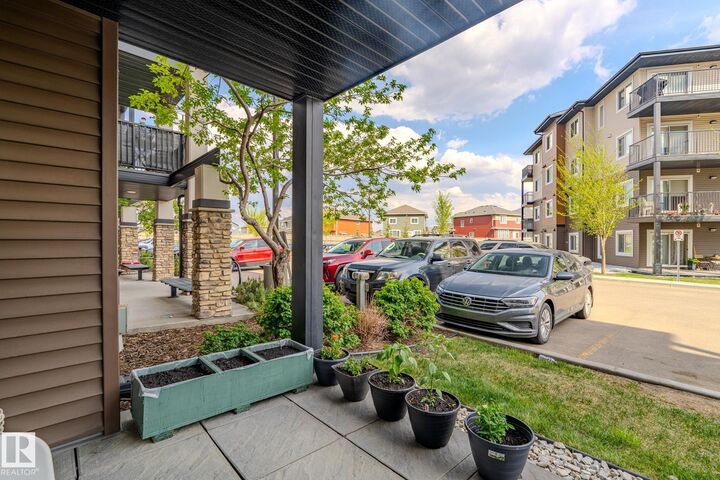 Property Photo: 142 Ebbers Boulevard NW 107 AB T5Y 3W2