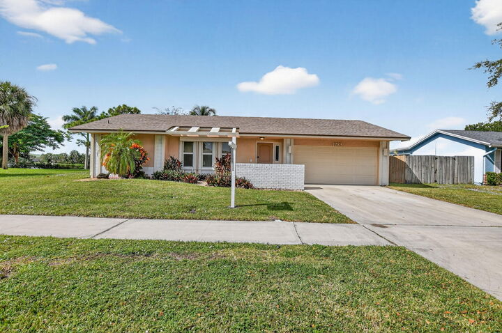 Property Photo:  1273 SW 25th Avenue  FL 33442 