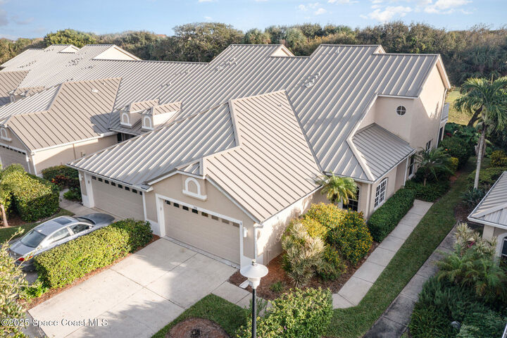 Property Photo: 115 Aquarina Boulevard FL 32951