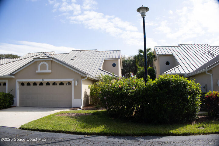 Property Photo: 115 Aquarina Boulevard FL 32951