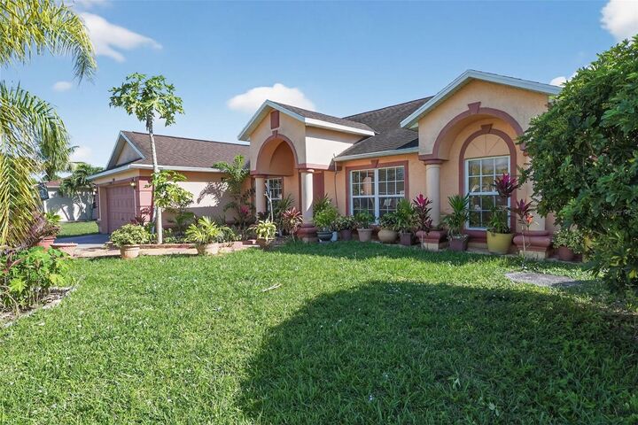 Property Photo:  2477 SW Falcon Circle  FL 34953 