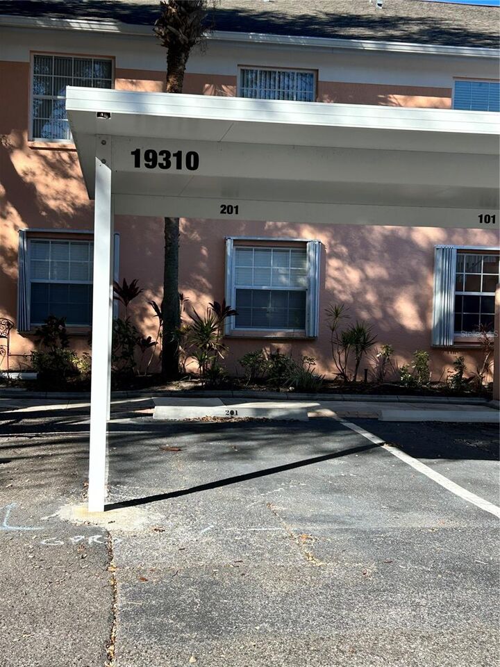 Property Photo: 19310 Water Oak Drive 201 FL 33948