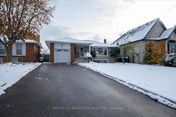 Property Photo:  57 Anewen Drive Main  ON M4A 1R9 