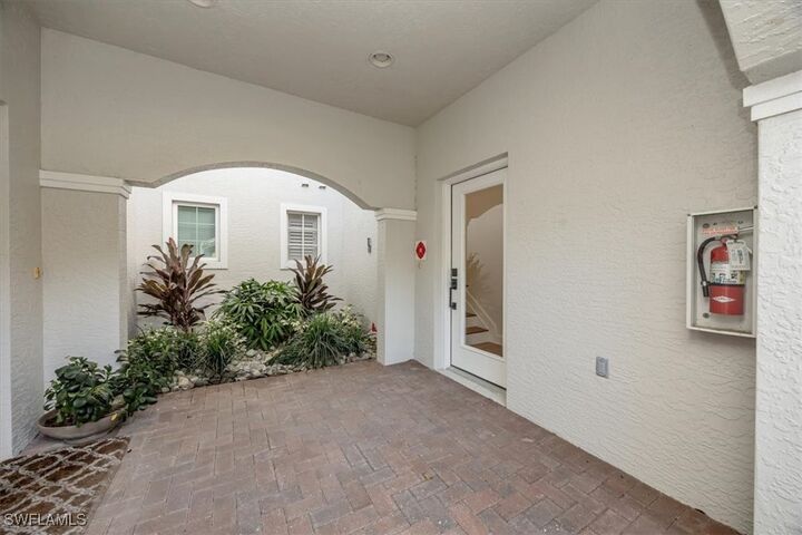 Property Photo:  9151 Palmetto Ridge Drive 202  FL 34135 