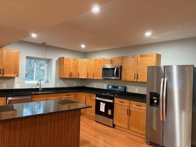 Property Photo:  182 Avenue C  RI 02895 