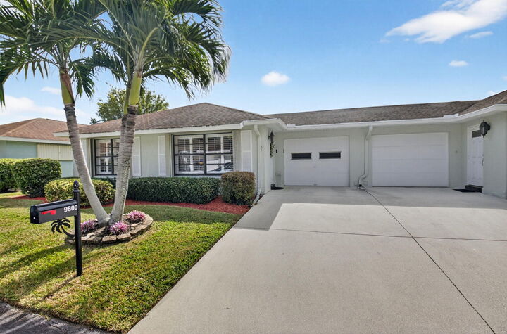Property Photo:  9800 Tabebuia Tree Drive A  FL 33436 