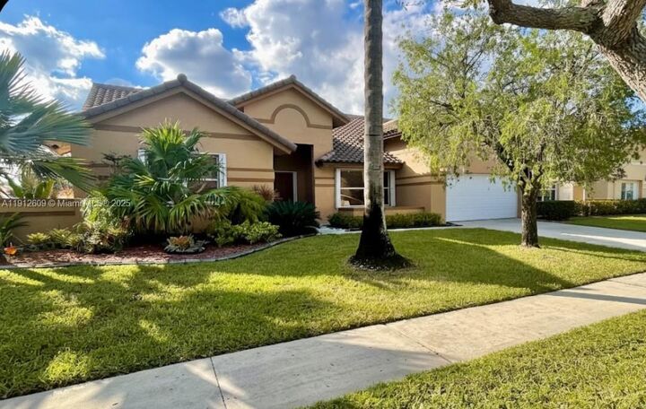 Property Photo:  1200 NW 161st Ave  FL 33028 