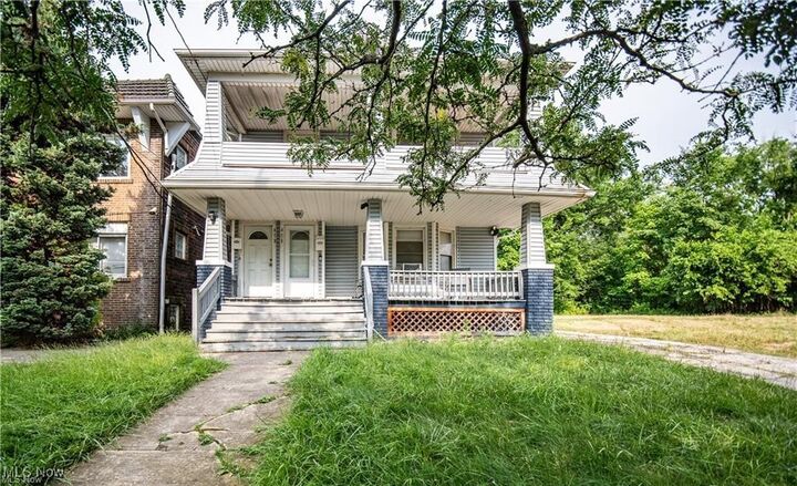 Property Photo:  873-875 E 141st Street  OH 44110 