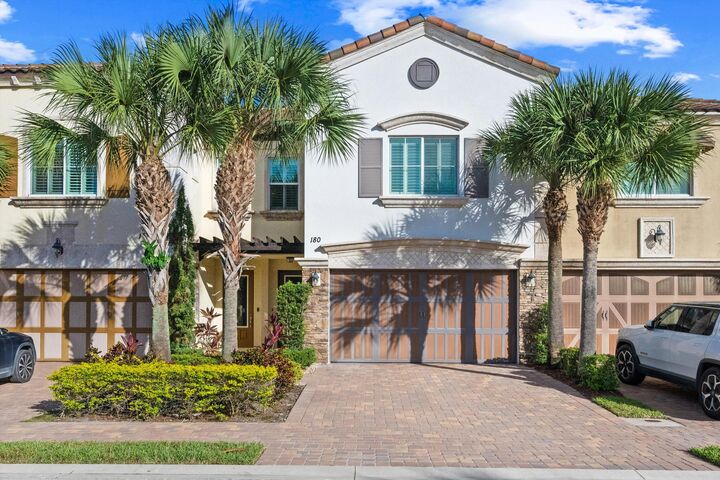 Property Photo: 180 Sword Fern Place FL 33414