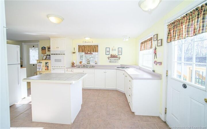 Property Photo:  23 Moore Road  NB E3B 7Z5 