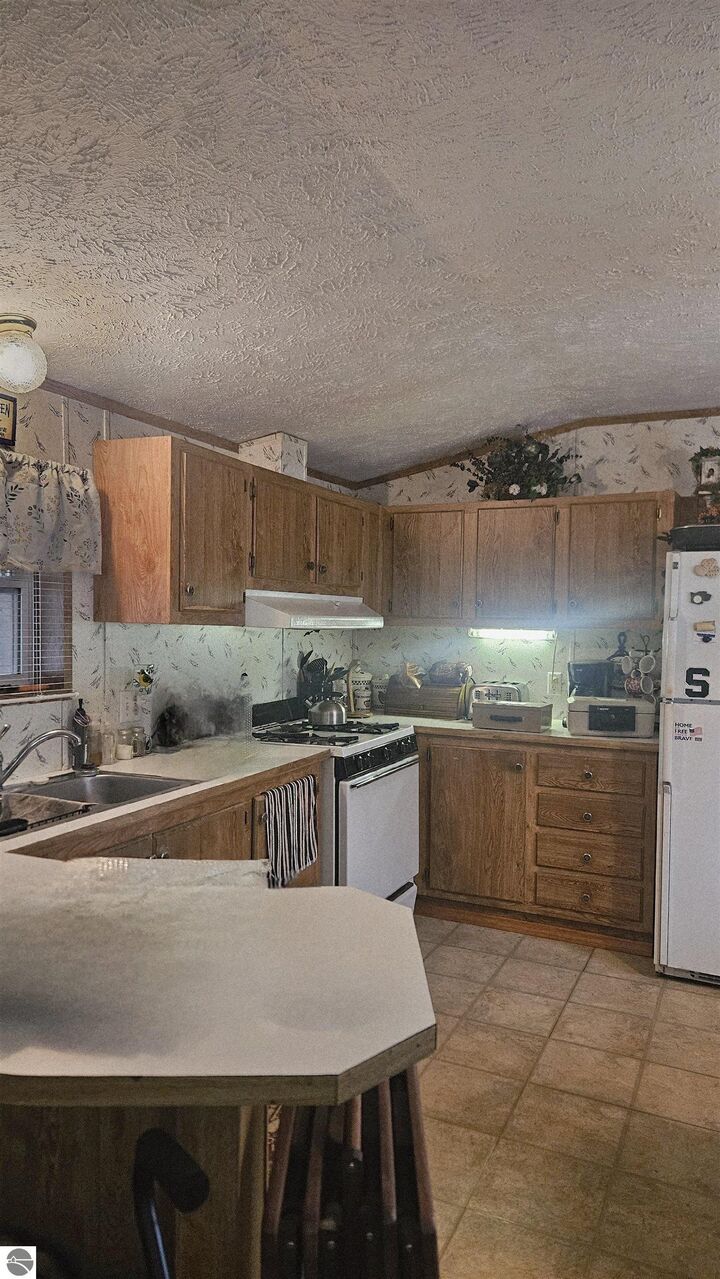 Property Photo:  1265 Channel Way  MI 48624 