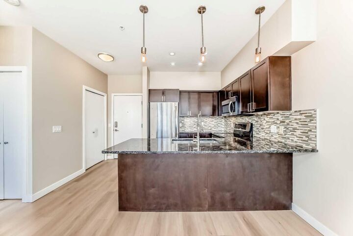 Property Photo:  4303 1 Street NE 201  AB T2E 7M3 