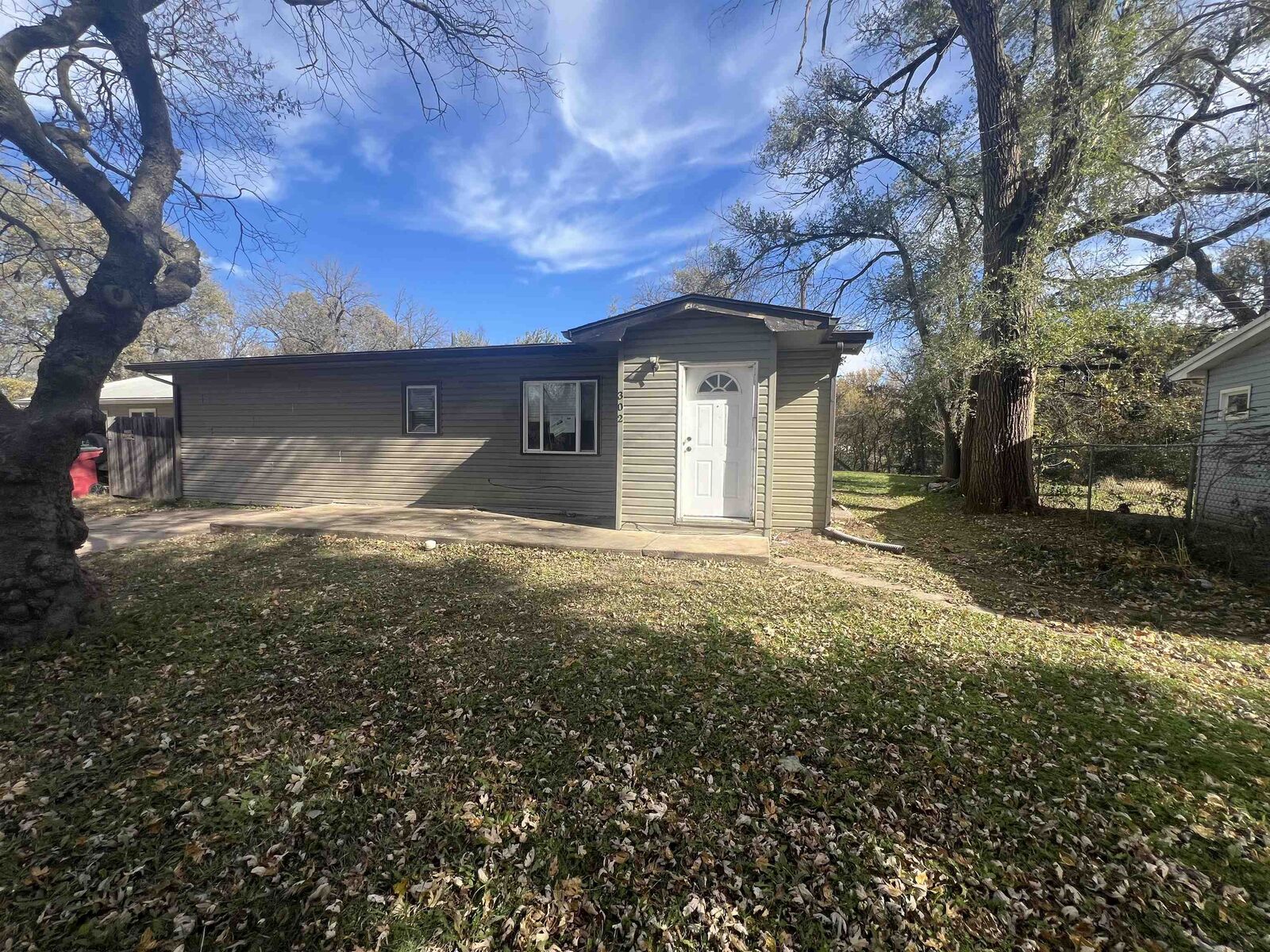 Property Photo:  302 S Stewart  KS 67060 