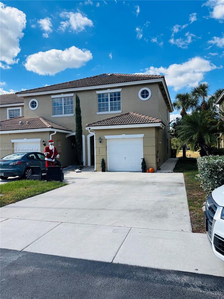 Property Photo:  208 SW 120th Ave  FL 33025 