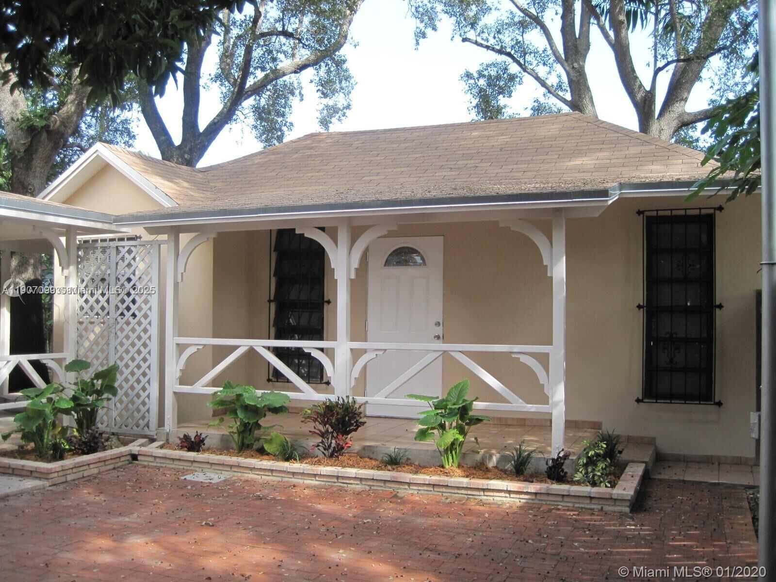 Property Photo:  5661 SW 4th St 5661  FL 33134 