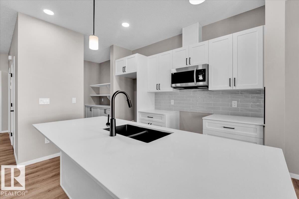 Property Photo:  135 Hilton Cove  AB T7X 1Y4 