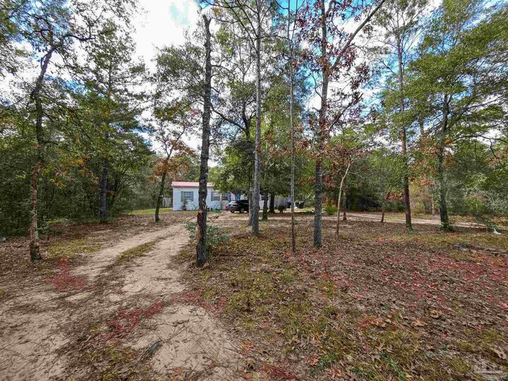 Property Photo:  203 W Picasso Cir  FL 32433 