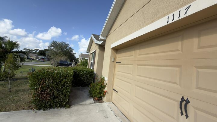 Property Photo: 1117 SW Goodman Avenue FL 34953
