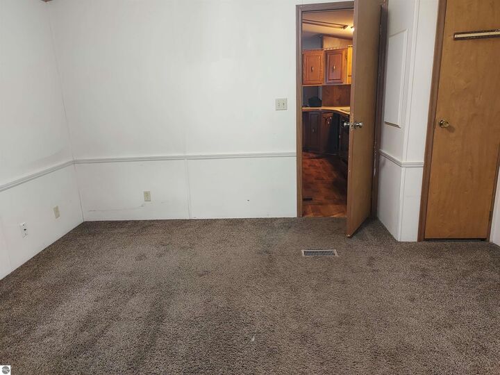 Property Photo:  2787 Ray Boulevard  MI 49686 