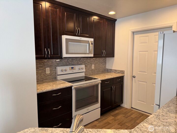 Property Photo:  23512  55 Avenue S 16  WA 98032 