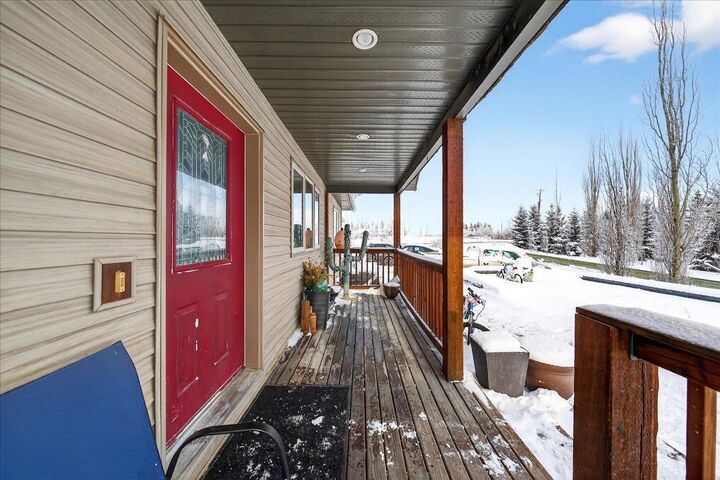 Property Photo: 1 De Winton Ridge Road AB T1S 4W6