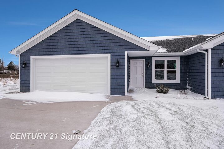 Property Photo: 8483 N River Rock Drive MI 48623