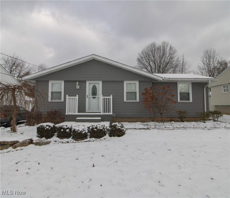 Property Photo: 8183 Venice Heights Drive NE OH 44484